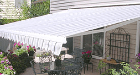 Cool off the Little League Champions in the Backyard under the Eclipse Retractable Awning
