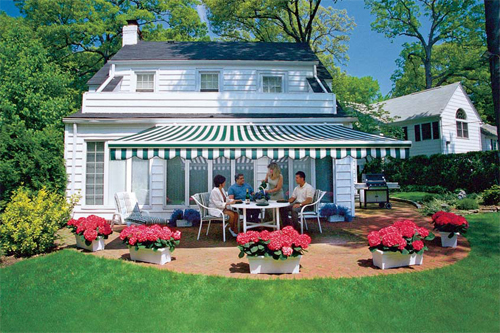 Summertime dining in the shade of a retractable awning
