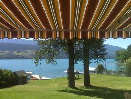 Add appeal to your lakefront property with retractable awnings